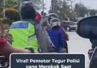 Pemotor Tegur Polisi yang Merokok Saat Berkendara di Lampu Merah