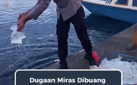 Video Oknum Polisi Buang Bungkusan Diduga Miras ke Laut Viral