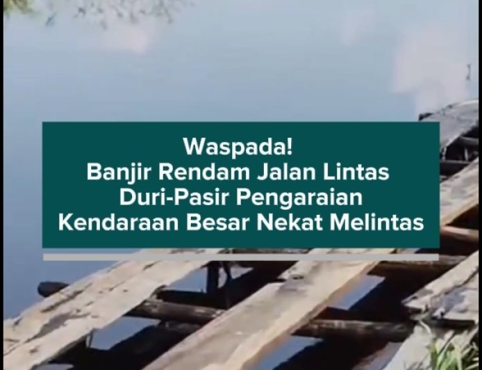 Waspada! Banjir Rendam Jalan Lintas Duri-Pasir Pengaraian, Kendaraan Besar Nekat Melintas