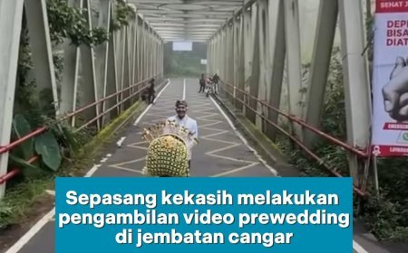 Sepasang Kekasih lakukan prewdding di Jembatan Cangar