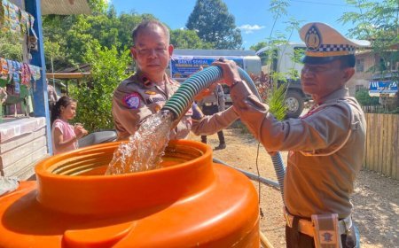Polres Berau Gelar Bakti Sosial, Bagikan Air Bersih Ke Warga Gunung Tabur